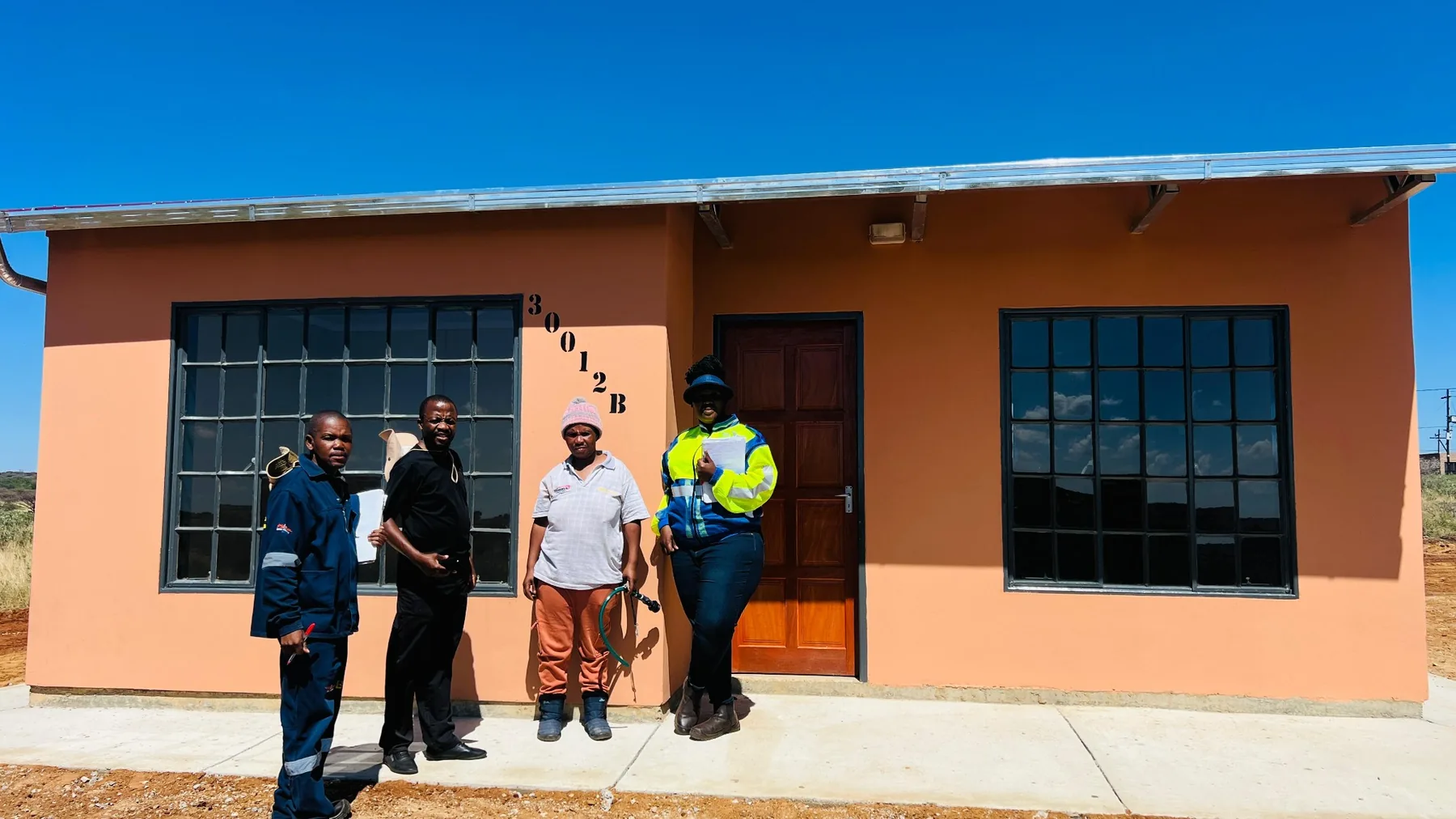 Housing handover in Khunwana