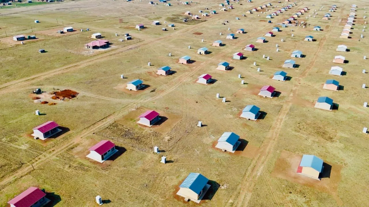 Aerial view of completed housing units in Kopela Village